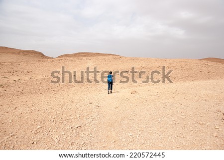 Hiking in stone desert in Israel