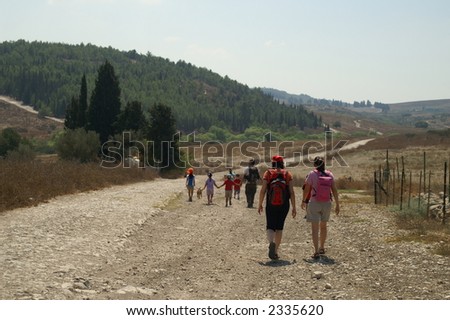 family walking at weekend - trek in Israel - sport activity