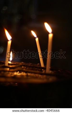 Candles - romantic atmosphere - light in a dark night