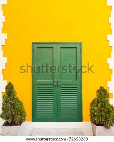 Green door in the orange wall