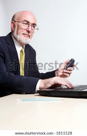 Businessman holding phone