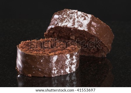Chocolate cake slices on granite surface