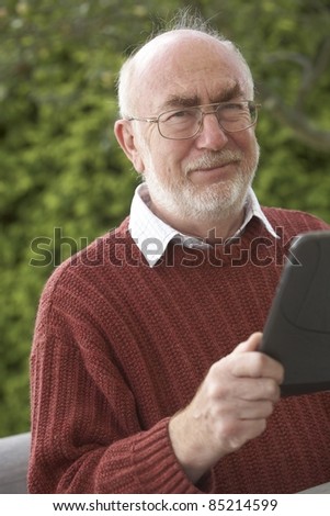 Senior man using a Tablet PC