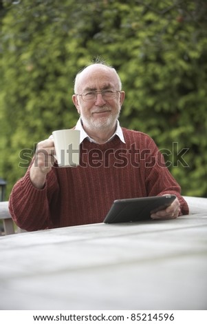 Senior man using a Tablet PC