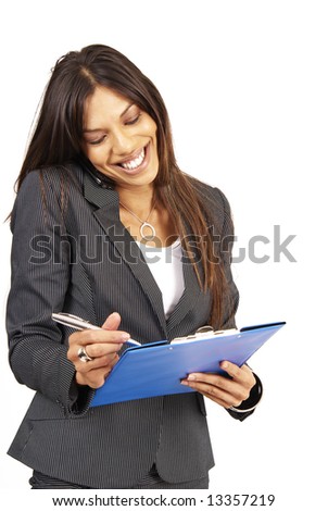 Beautiful brunette woman in pinstripe suit holding her clipboard. Isolated on white background with copy space