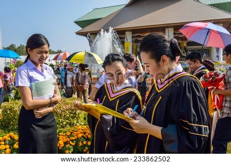 CHIANGMAI  THAILAND OCTOBER 19 : Unidentified New graduates at Chiangmai Rajabhat University Saluang - Khi Lek campus  fill in the questionnaire on October 19, 2014 Chiangmai Thailabd.