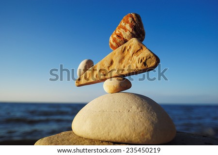 Zen balance of the stones on the seacoast
