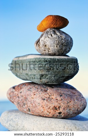 Sea pebble piled on the bank of northern sea
