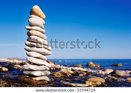 High stack of gravel on the coast