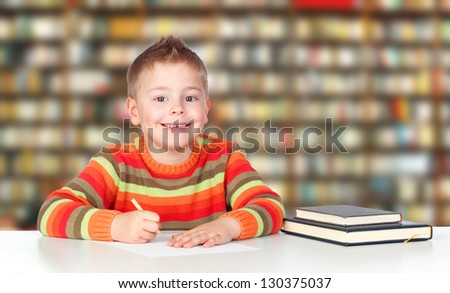elementary schooler doing homework in the library
