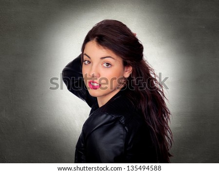 Portrait Of Young Beautiful Woman Over Colored Background