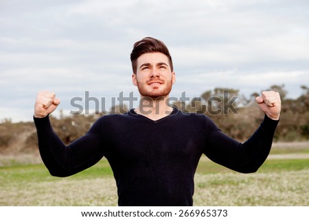 Handsome guy with open arms very strong