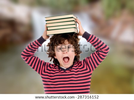 Crazy child with books on his head shouting