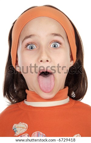 Cute girl sticking out her tongue over white background
