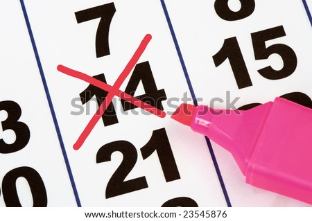 Page of the calendar and fluorescent with the number fourteen deleted