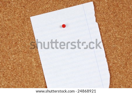 Blank sheet of paper on pin board