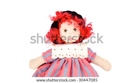 Beautiful rag doll on a white background