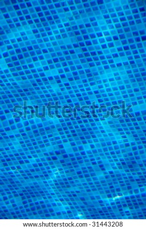 Clean water in a blue swimming pool
