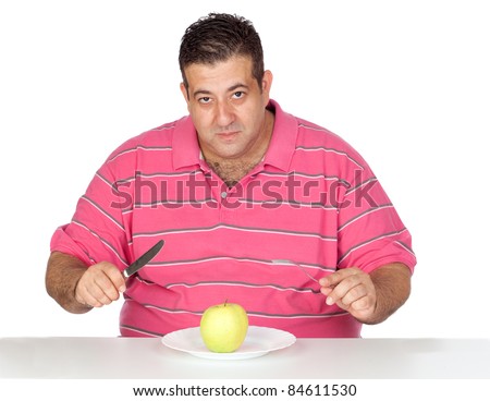 Fat man eating a apple isolated on white background