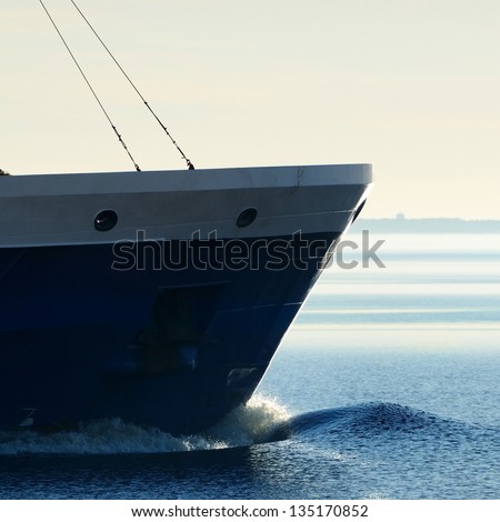 cargo ship\'s bow heading forward