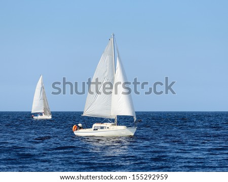 two white sail yachts sailing. Riga, Latvia