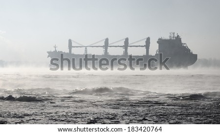 Cargo ship (Bulk carrier) sailing. Riga, Latvia