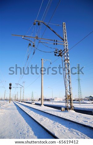 frozen railway covered with snow