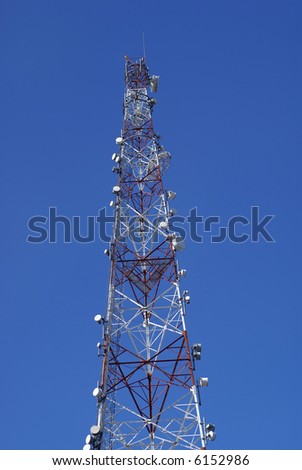 communications tower with microwave and radio antennas