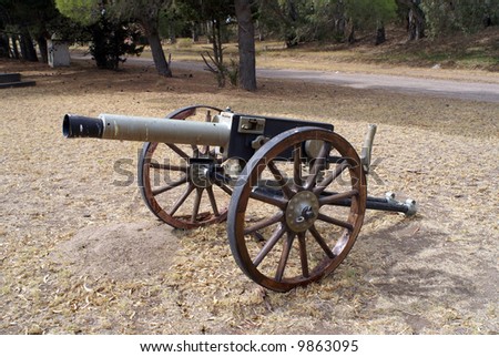 old machine gun with wheels from the army