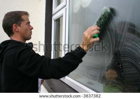 Window cleaner washing windows