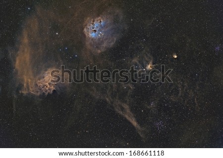 Wide Field View of the Flaming Star and Tadpole Nebulae in the Hubble Palette