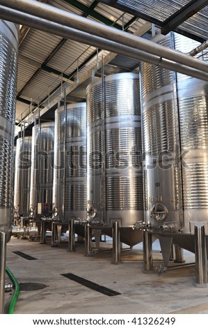 Processing wine in a Spanish wine making facility near Barcelona