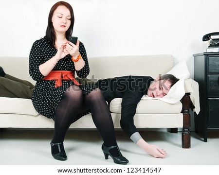 Woman checking telephone of her man