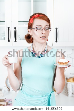 Beautiful woman with cake and coffee