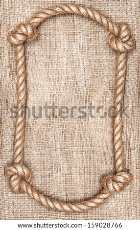 Rope frame and burlap textile background