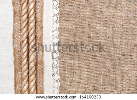 Burlap background, rope and linen cloth with lace