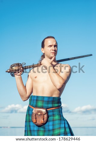Scottish man with sword