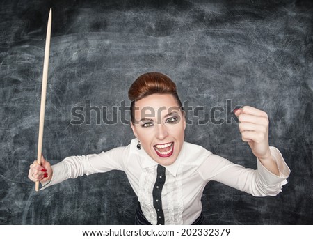 Angry screaming teacher with pointer