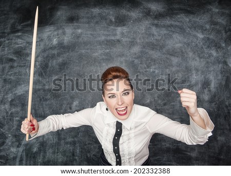 Angry screaming teacher with pointer