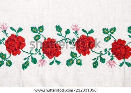 Embroidery flowers on the linen textile