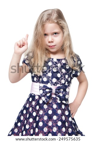 Strict beautiful little girl with blond hair isolated over white background