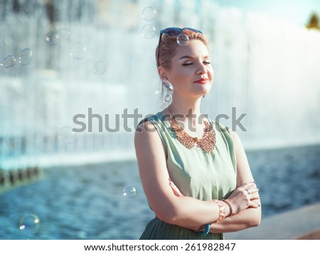 Hipster beautiful young girl in vintage clothing outdoor