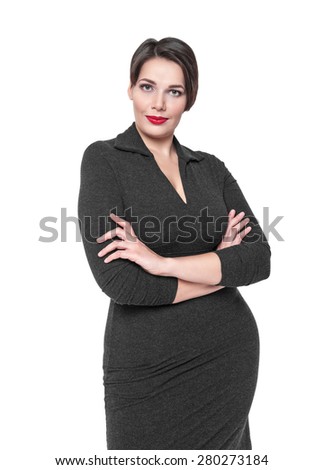 Beautiful plus size woman in black dress posing isolated on white background