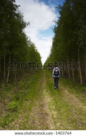 Girl walking along old trail