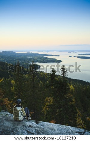 Woman looking into distance in Finnish national park