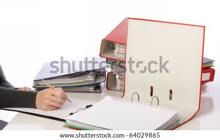 businesswoman - woman hand pen. Pile of folders with old documents and bills. Isolated on white background