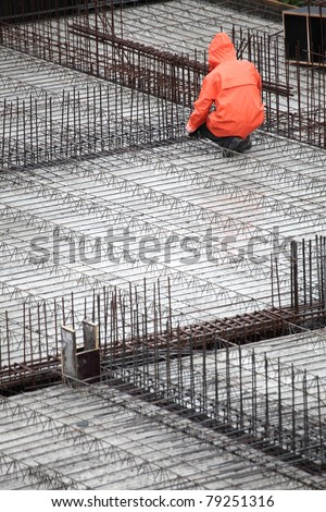 man, worker in construction building