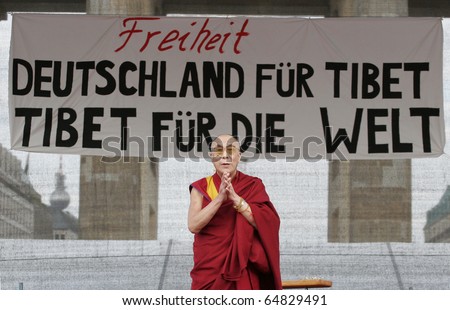 BERLIN - MAY 19 : The Dalai Lama speaks to his supporters  at the Brandenburger Gate in Berlin, 19.05.2008
