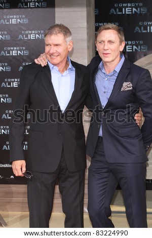 BERLIN, GERMANY - AUGUST 08: Harrison Ford and Daniel Craig attend the \'Cowboys and Aliens\' premiere in Cinestar on August 8, 2011 in Berlin, Germany.