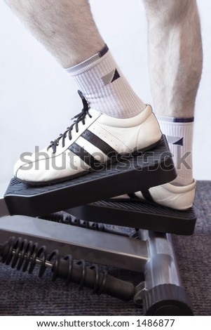 Fitness (Man\'s Legs On A Fitness Machinery)